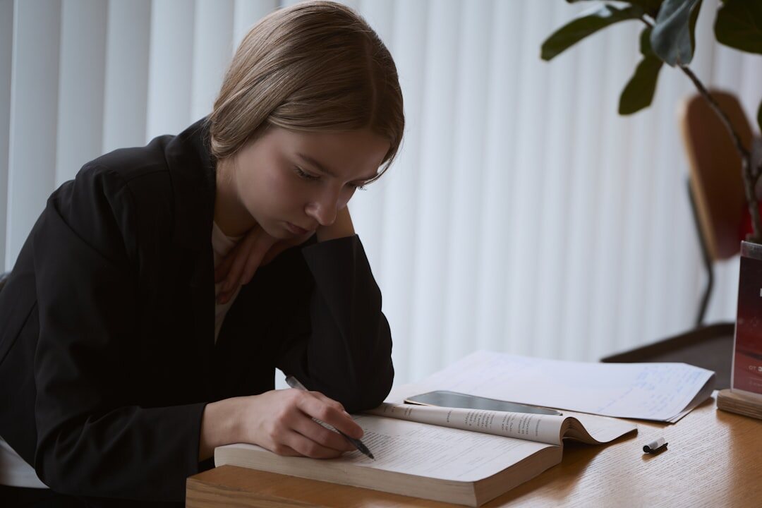 Journalist writing at a desk