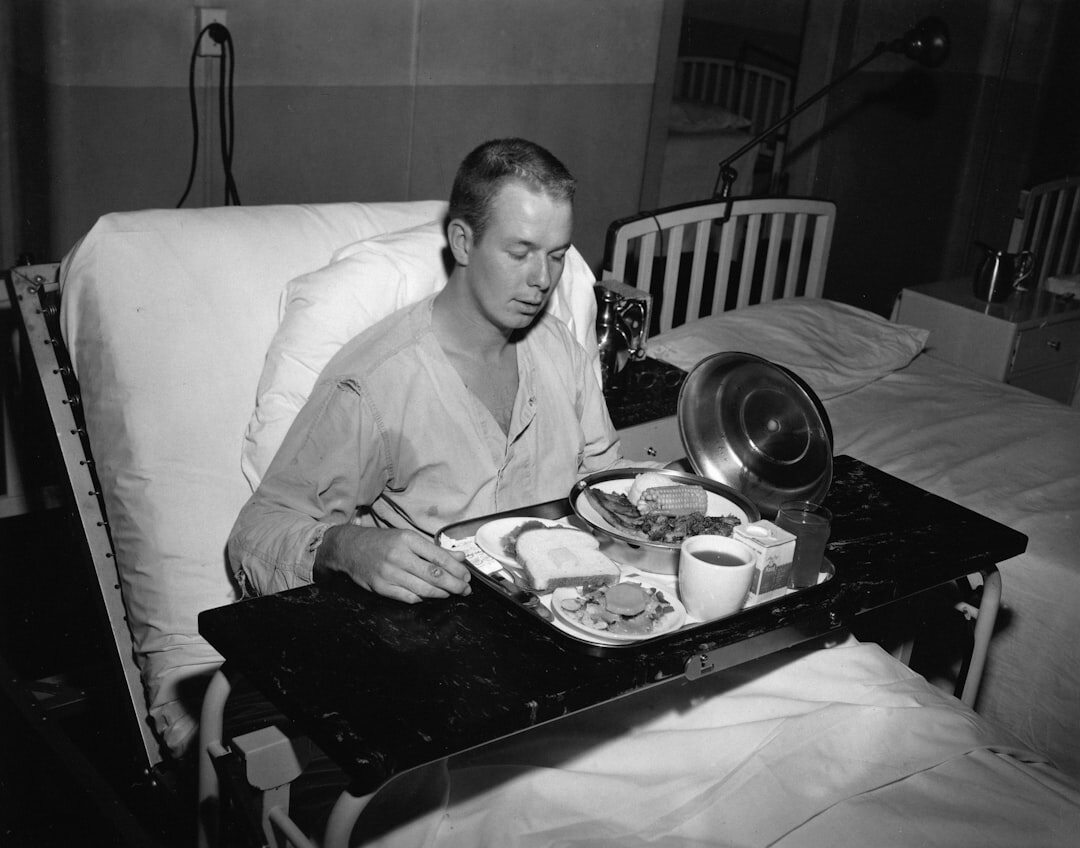 elderly man in hospital bed