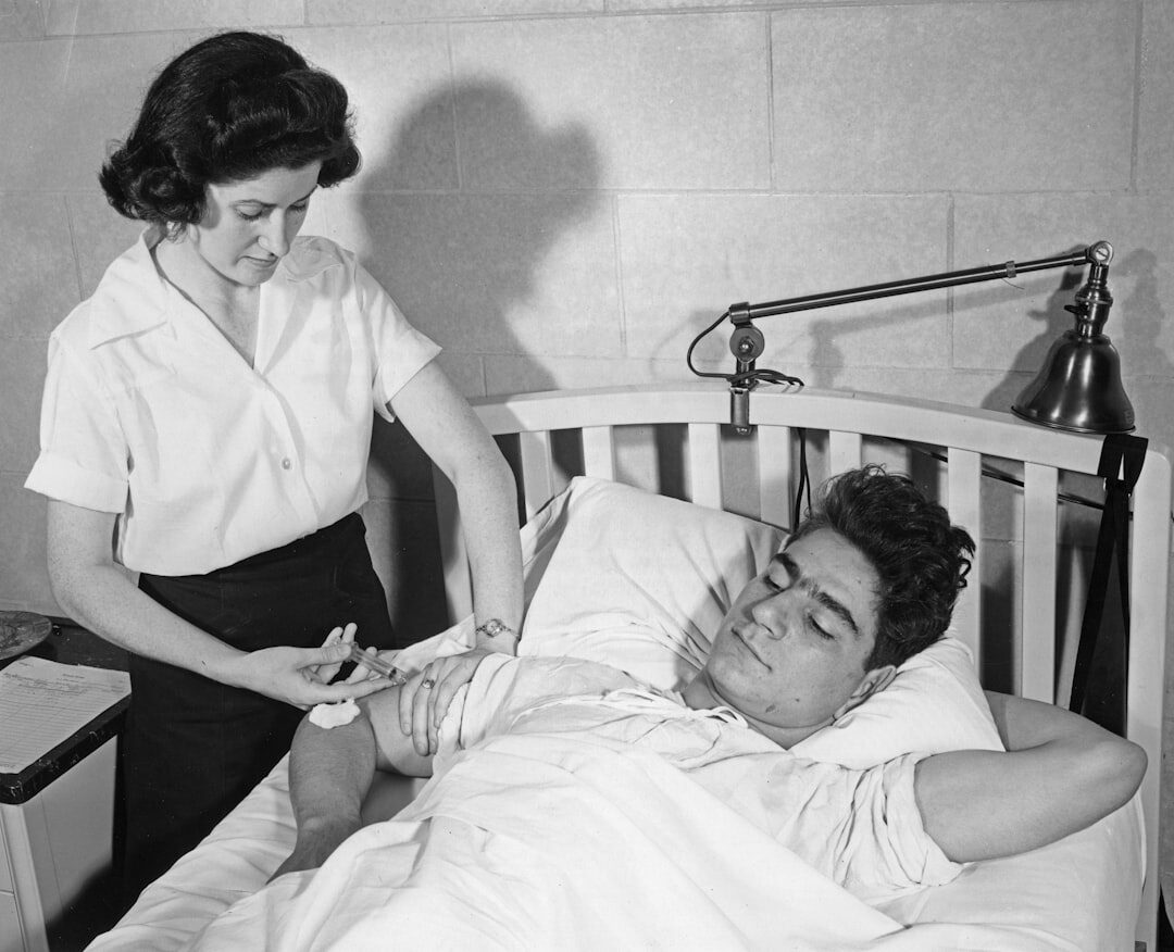 elderly man in hospital bed
