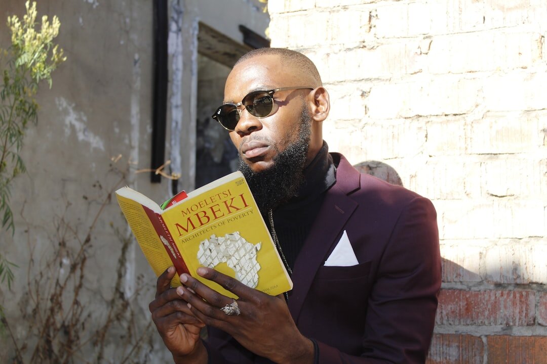 famous writer holding book